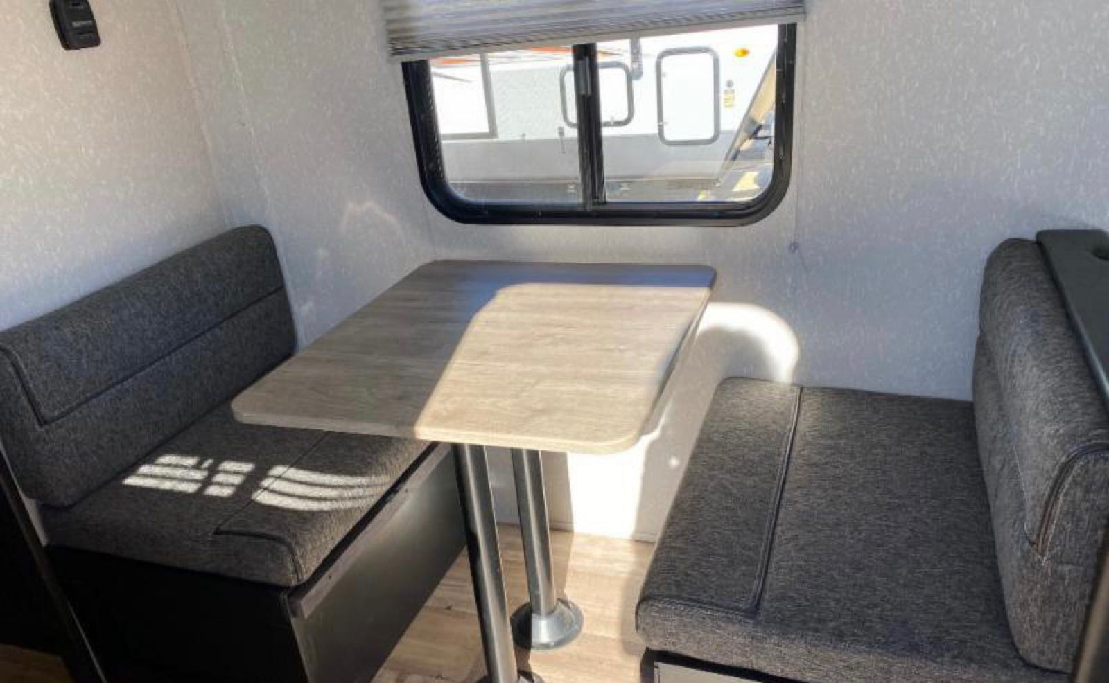ready for your next adventure.|Rear view of a Wolf Pup travel trailer
