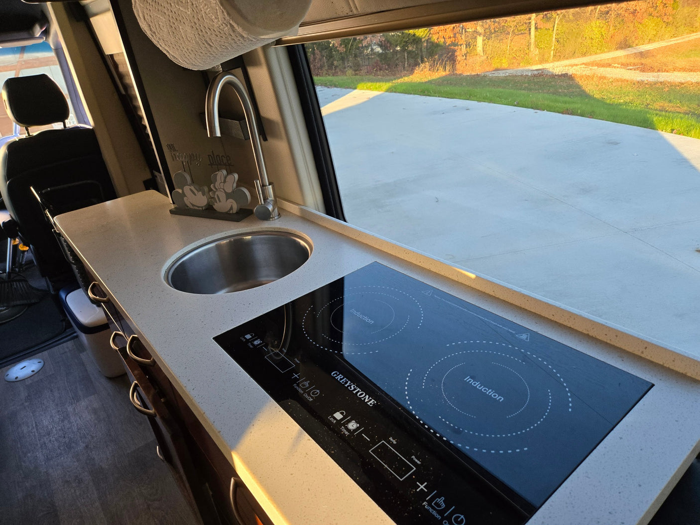 two-door refrigerator/freezer integrated into wooden cabinetry