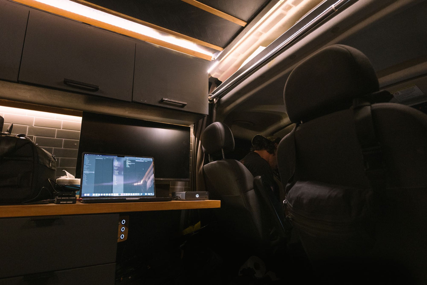 ready for off-road trips and remote camping.|Epic night sky with Milky Way over an RV rental. Van camping