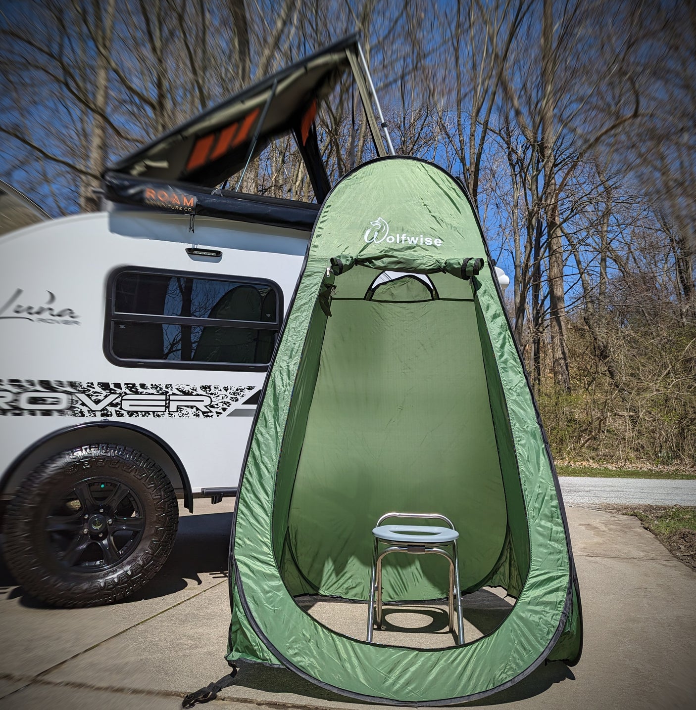 RV rental-ready: Luna Rover teardrop camper & Wolfwise portable privacy tent with commode. Perfect for camping adventures.