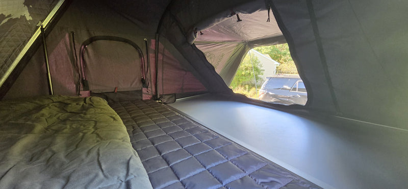 Interior of the Skycamp 3.0 showing the mattress, side window and large screened door panel — photo 5