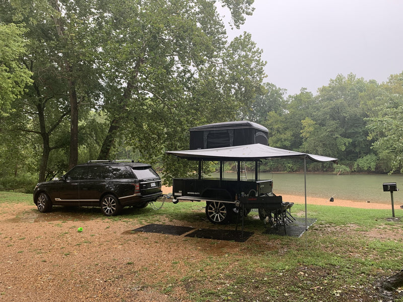 XV-2 parked lakeside with the awning extended over the camp area — photo 8