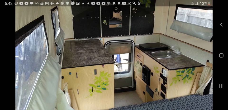 Four wheel camper fleet model front dinette in Denver, CO (photo 7) — photo 7