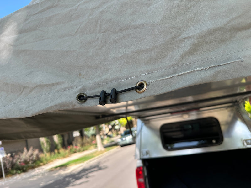 2020 AT Overland Habitat Camper — Repaired grommet on rain skirt — photo 15