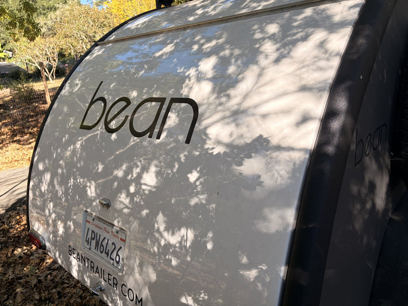 Bean logo and branding on camper side panel — photo 6