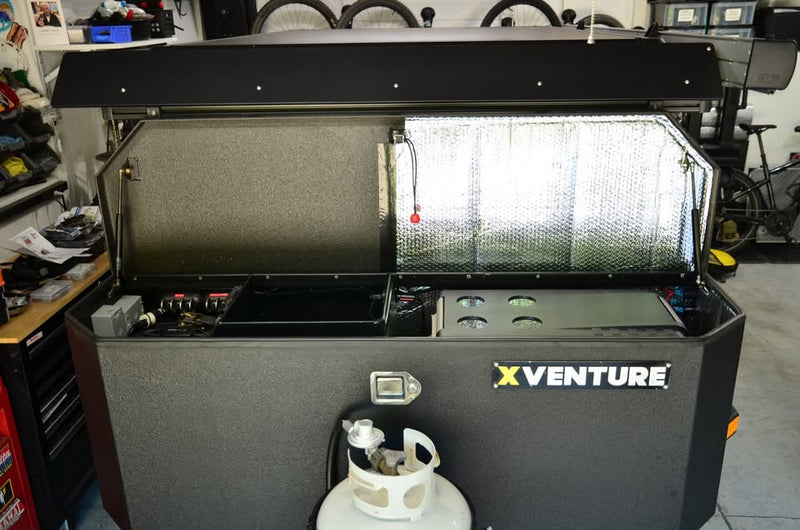 2014 Schutt Industries XVenture XV-2 overland trailer — galley kitchen and front nose box with XVenture branding — photo 10