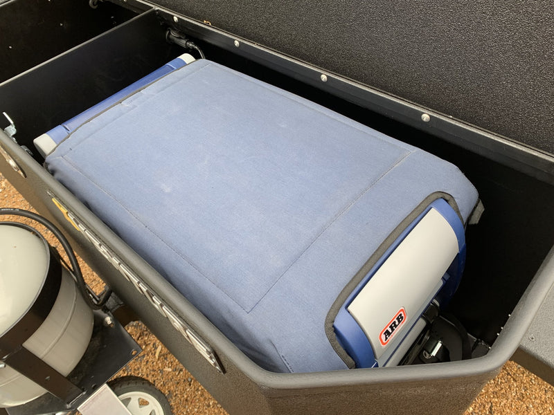 Galley box open with the seat cushion in place and the ARB portable fridge/freezer stowed alongside — photo 20