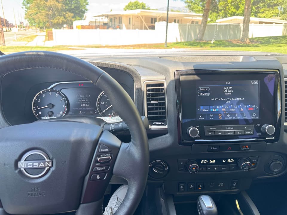 2024 Nissan Frontier Crew Cab · SL Pickup 4D 5 ft — photo 7