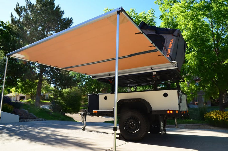 2014 Schutt Industries XVenture XV-2 overland trailer — ARB Touring awning fully extended over the campsite — photo 17