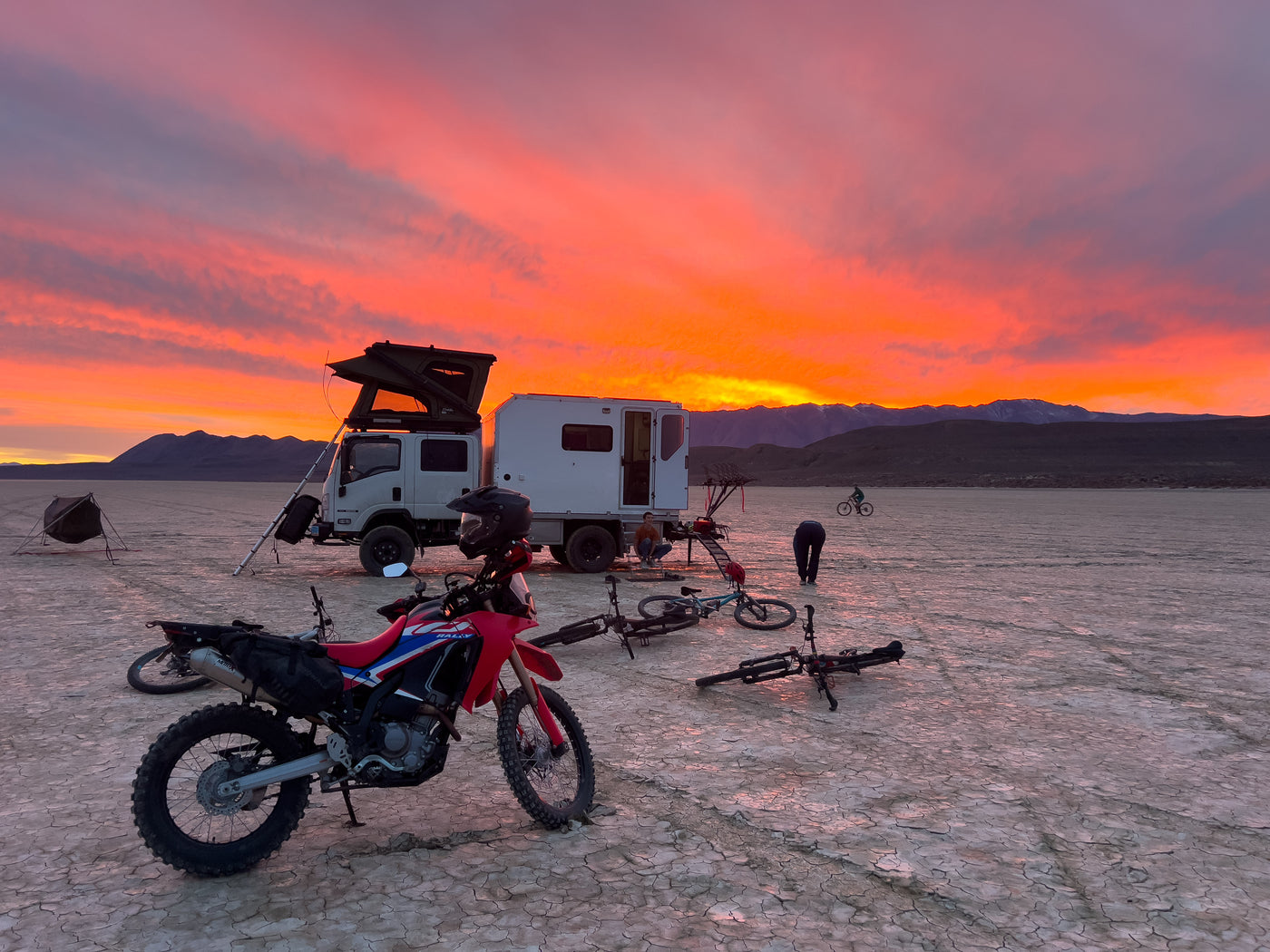 Rig at sunset with motorcycle and bikes unloaded — toy hauler setup — photo 10