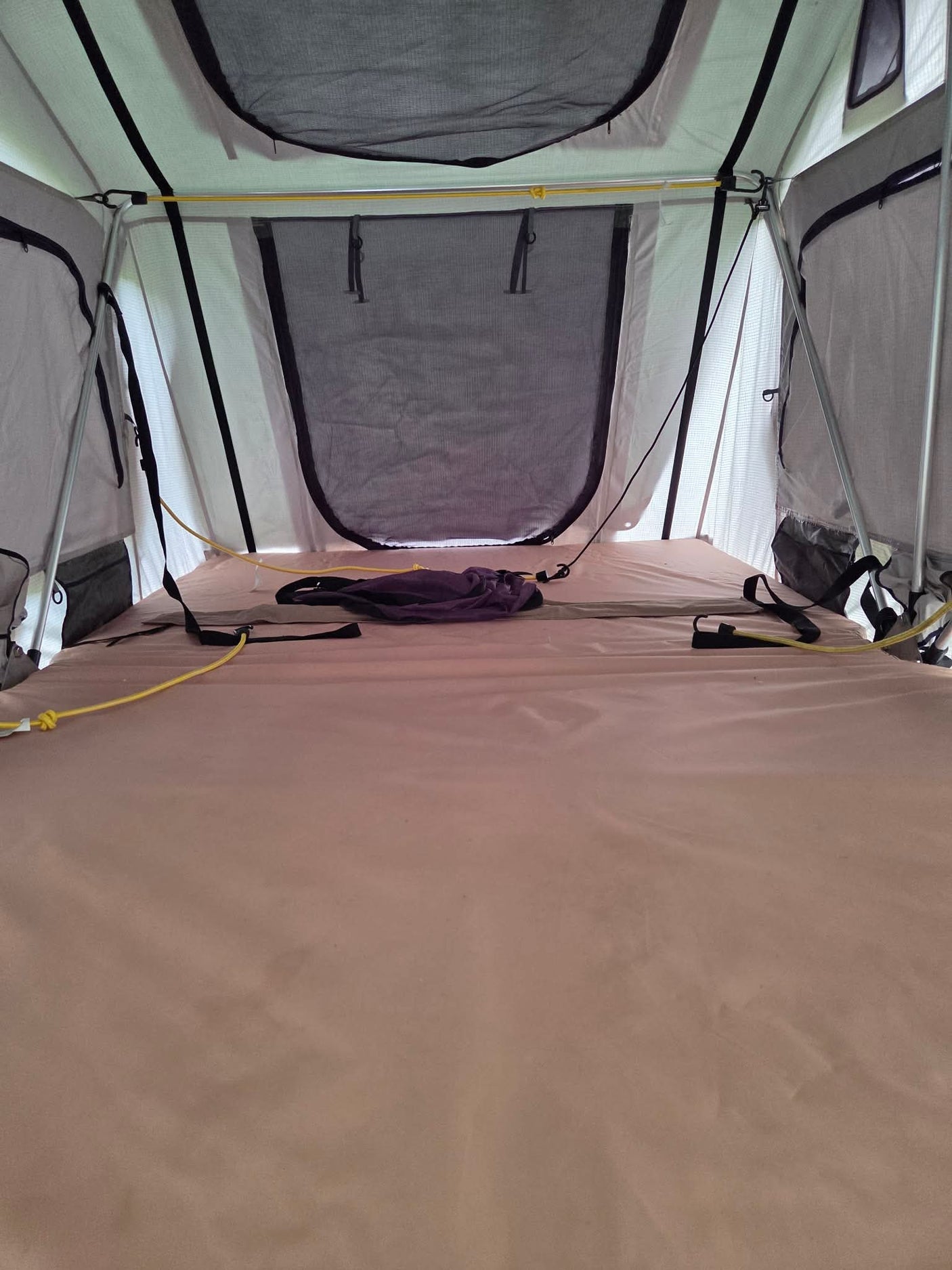 Interior sleeping area and mattress of the rooftop tent