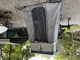 Front view of the rooftop tent with annex room and entry ladder