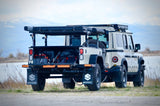 2014 Schutt Industries XVenture XV-2 overland trailer — front view hitched behind a 4x4 tow vehicle