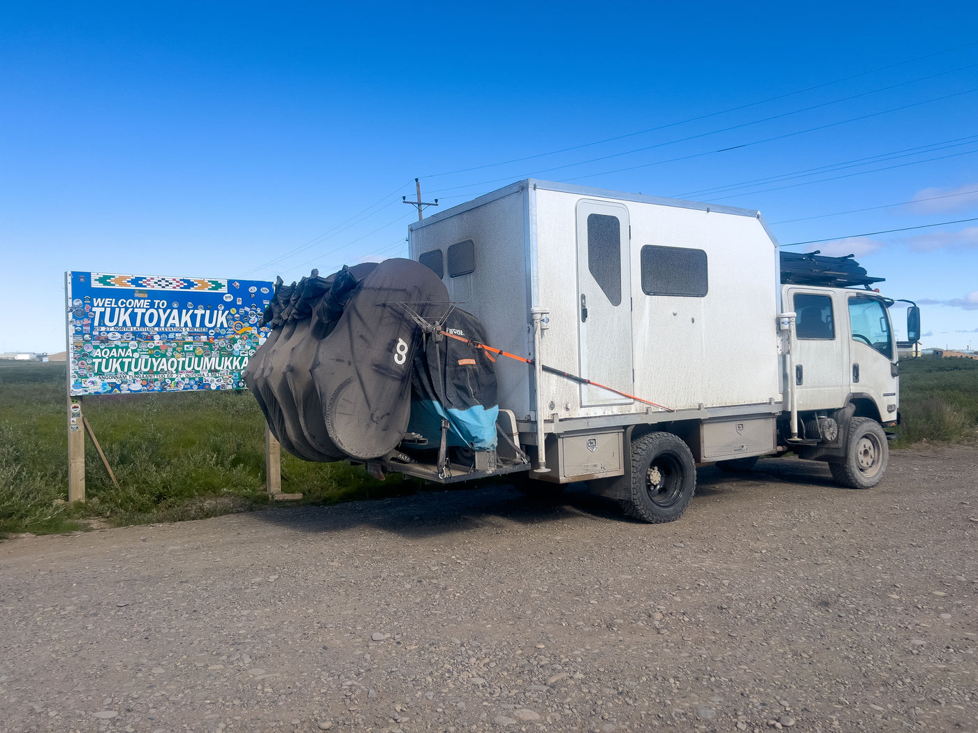 The rig at the Tuktoyaktuk welcome sign — photo 14