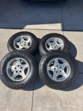 Falken Wildpeak A/T3W 235/75R15 Tires and Stock Jeep Grand Cherokee Wheels