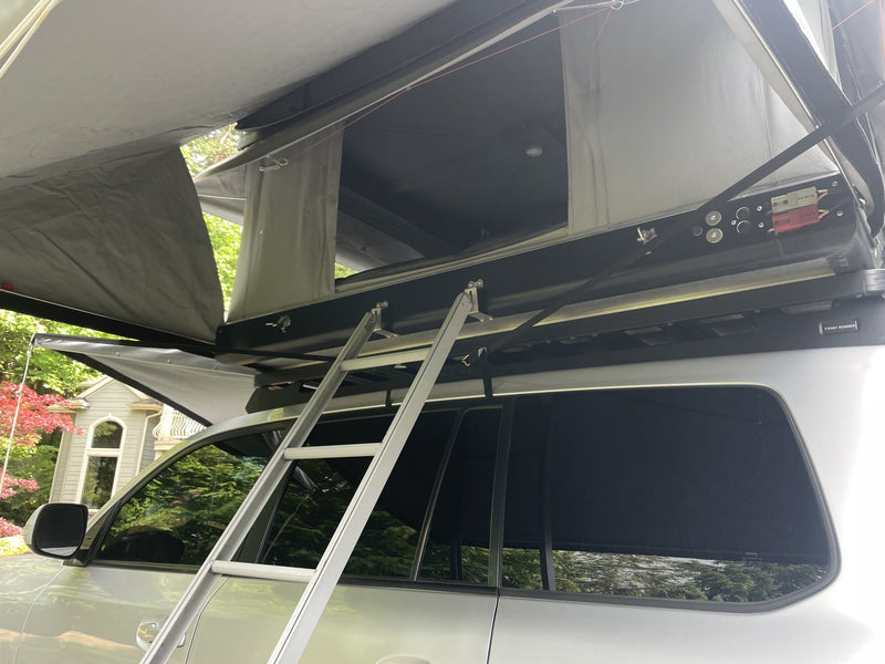 Bundutop rooftop tent open with telescoping ladder, close view — photo 3