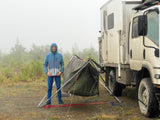Side profile of the Isuzu NPR expedition rig in fog
