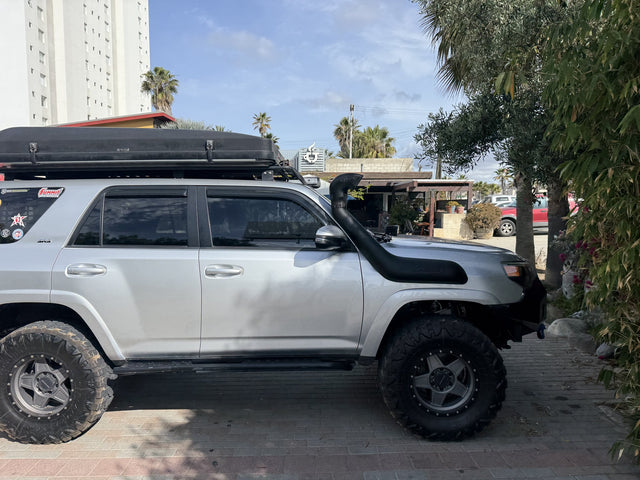 2014 Toyota 4Runner SR5 4x4 overland build, front three-quarter view with rooftop tent