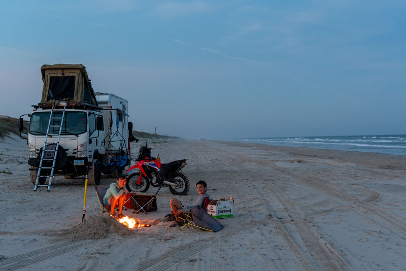 Beach camp with the rooftop tent open — photo 15