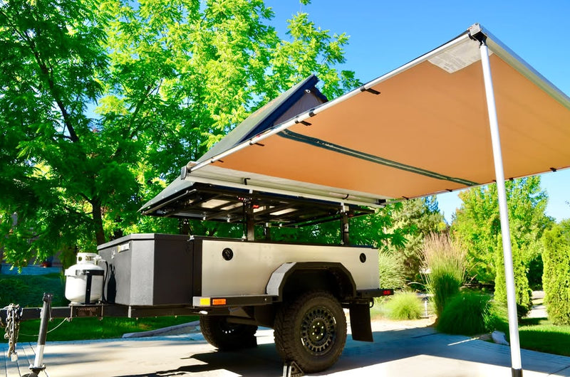 2014 Schutt Industries XVenture XV-2 overland trailer — ARB Touring awning deployed over the trailer — photo 9