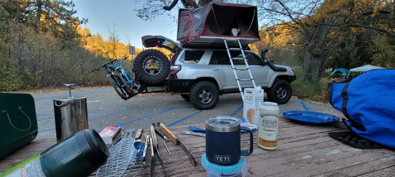 Campsite setup with the 4Runner, rooftop tent and gear — photo 13