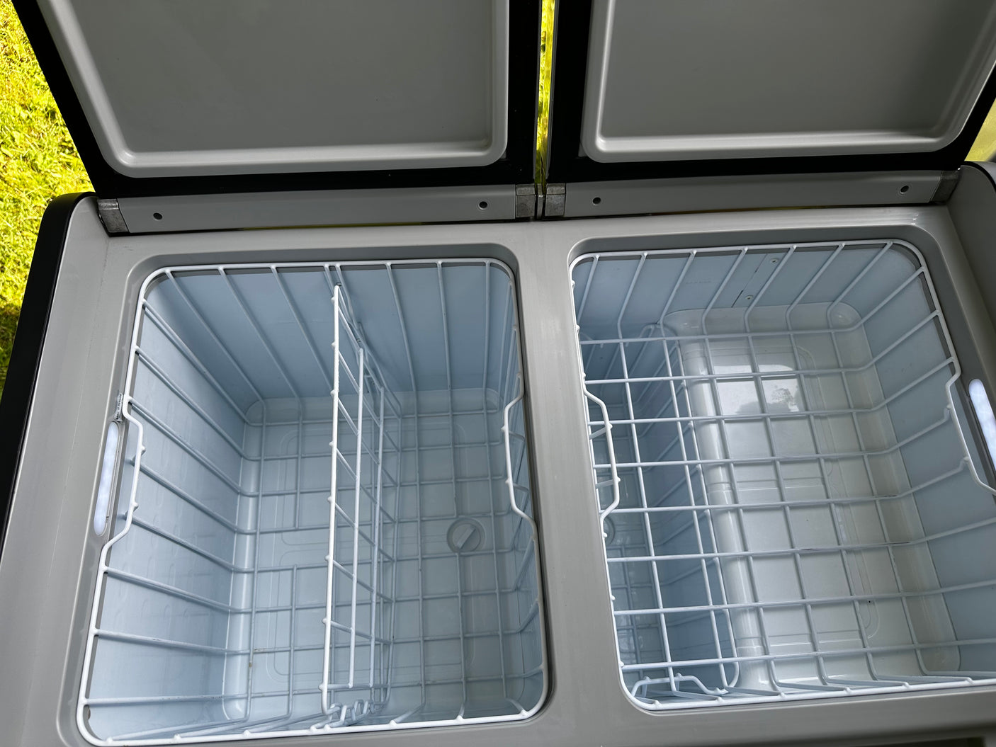 Dometic 75-liter fridge/freezer interior, empty and clean