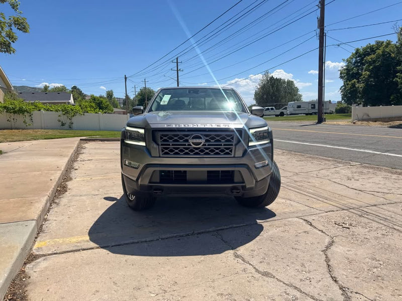 2024 Nissan Frontier Crew Cab · SL Pickup 4D 5 ft — photo 2
