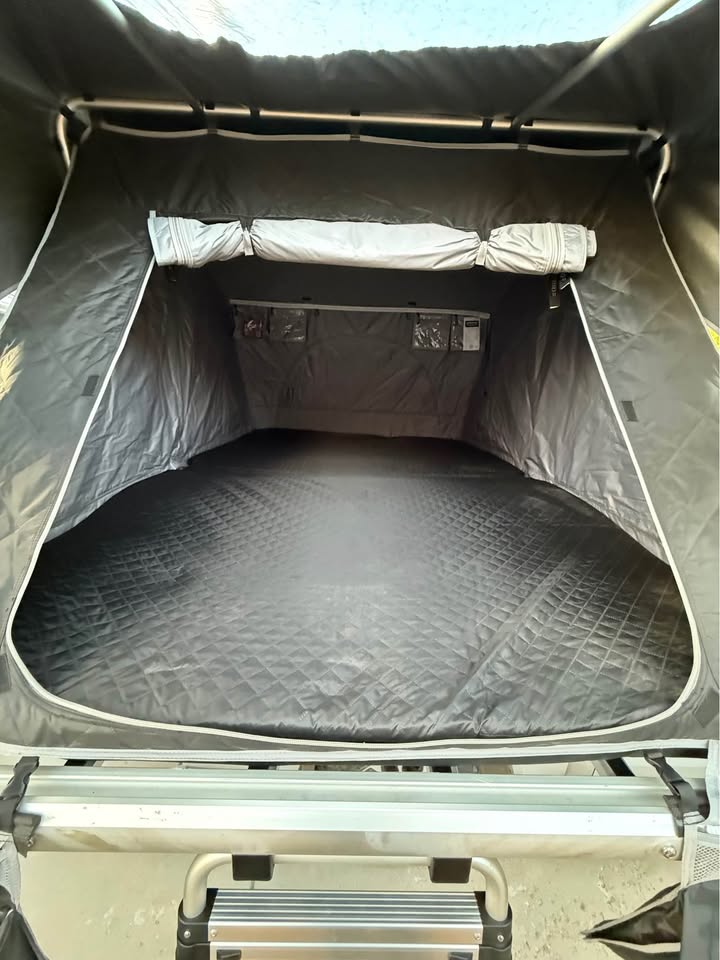 Free Spirit Recreation Rooftop Tent and Awning with RCI Bed rack in Frederick, CO (photo 9) — photo 9