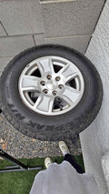 2017 Chevrolet silverado 1500 stock 17's on lightly used Falken Wildpeak H/T 255/70R17 Tire