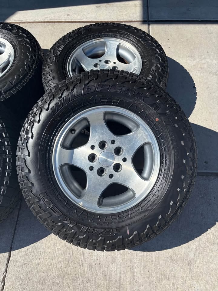 Falken Wildpeak A/T3W 235/75R15 Tires and Stock Jeep Grand Cherokee Wheels in Spanish Fork, UT (photo 2) — photo 2