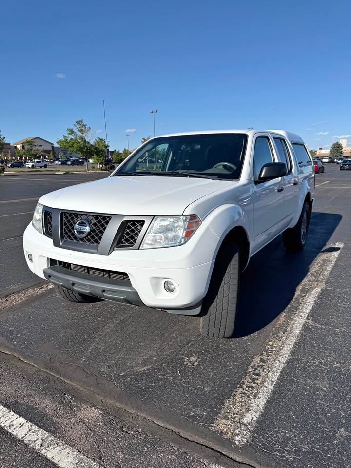2012 Nissan Frontier Crew Cab · SV (2017.5) Pickup 4D 5 ft in Colorado Springs, CO (photo 1) — photo 1