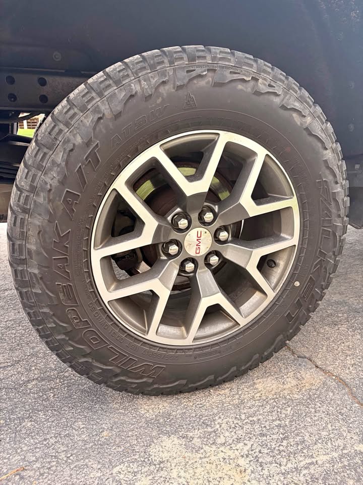 Falken Wildpeak A/T3W 265/65R17 Tires on GMC Wheels in Saratoga Springs, UT (photo 1) — photo 1