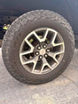 Falken Wildpeak A/T3W 265/65R17 Tires on GMC Wheels in Saratoga Springs, UT (photo 1)