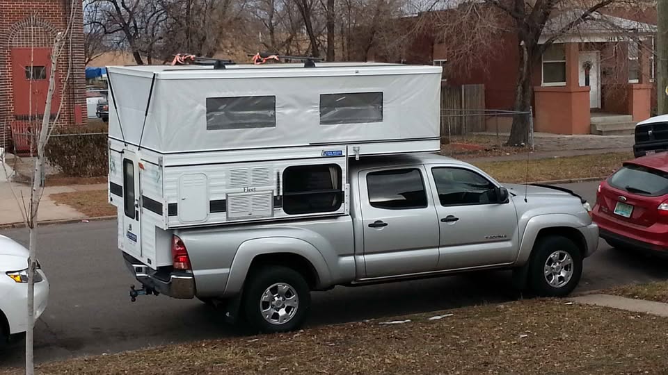 Four wheel camper fleet model front dinette in Denver, CO (photo 2) — photo 2