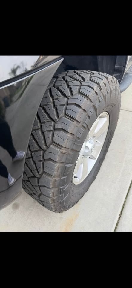 4 Nitto Ridge Grappler Tires 285/70R17 with Toyota Wheels — photo 2