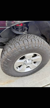 4 Nitto Ridge Grappler Tires 285/70R17 with Toyota Wheels in Fresno, CA (photo 1)