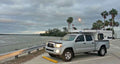 Four wheel camper fleet model front dinette