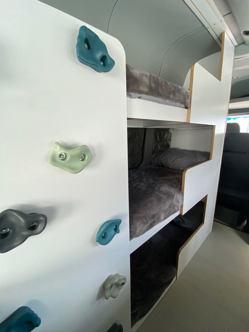  offering comfortable mobile living.|A white Mercedes Sprinter camper van with a roof rack — photo 3