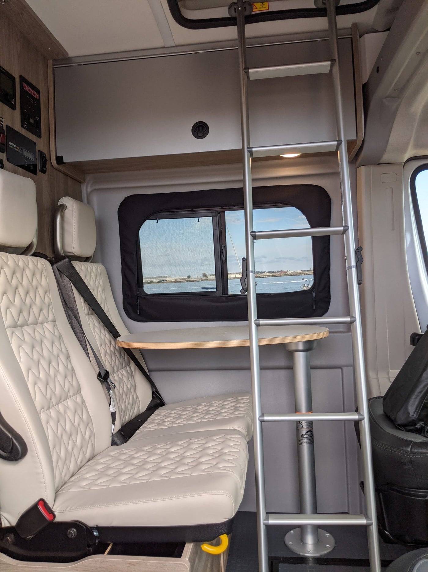  parked waterfront with open rear doors — photo 12