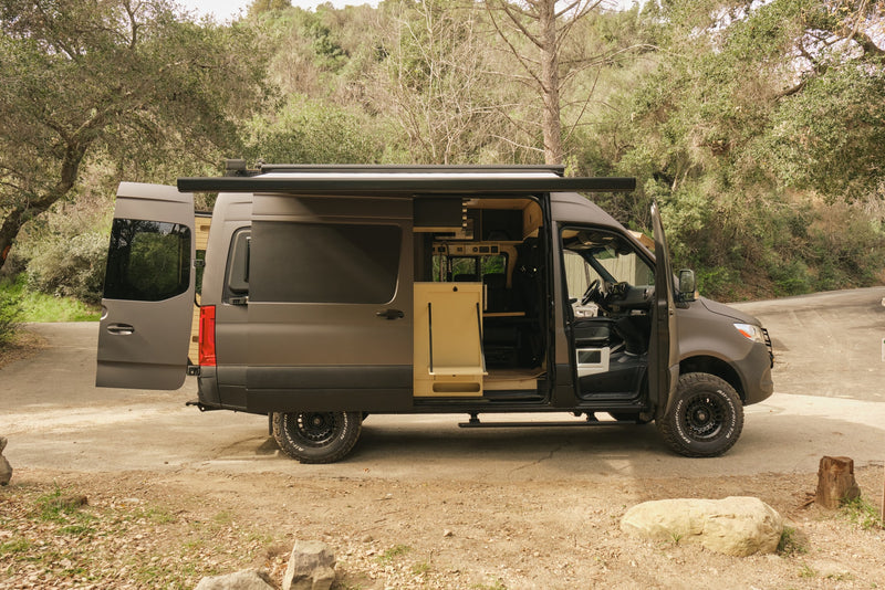  showing an interior counter and faucet.|Inside an RV rental: a modern kitchen with a pull-down faucet — photo 14