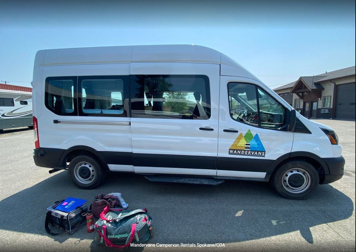  parked on asphalt with bags ready for adventure.|Webasto digital temperature control panel for RV rental