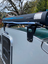 RV rental featuring a roof-mounted Road Shower 4 water tank, providing convenient outdoor hot water for campers.