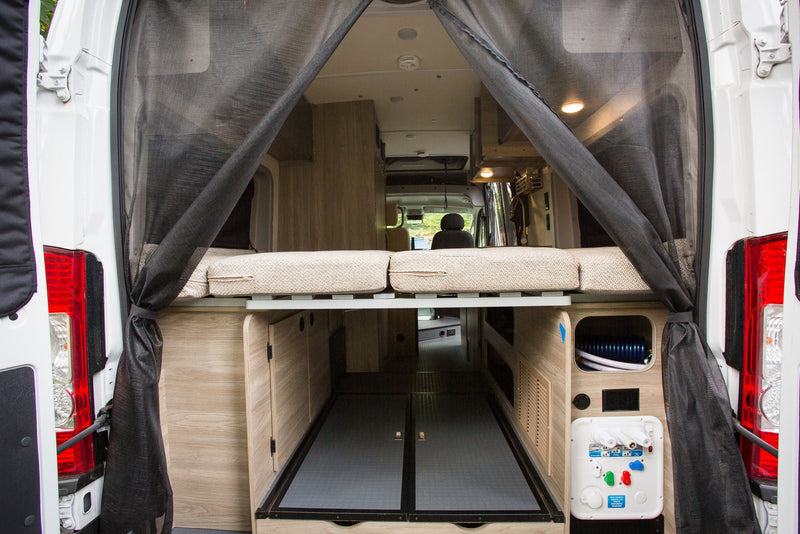  and side utility panel with mesh screens.|Inside an RV rental — photo 7