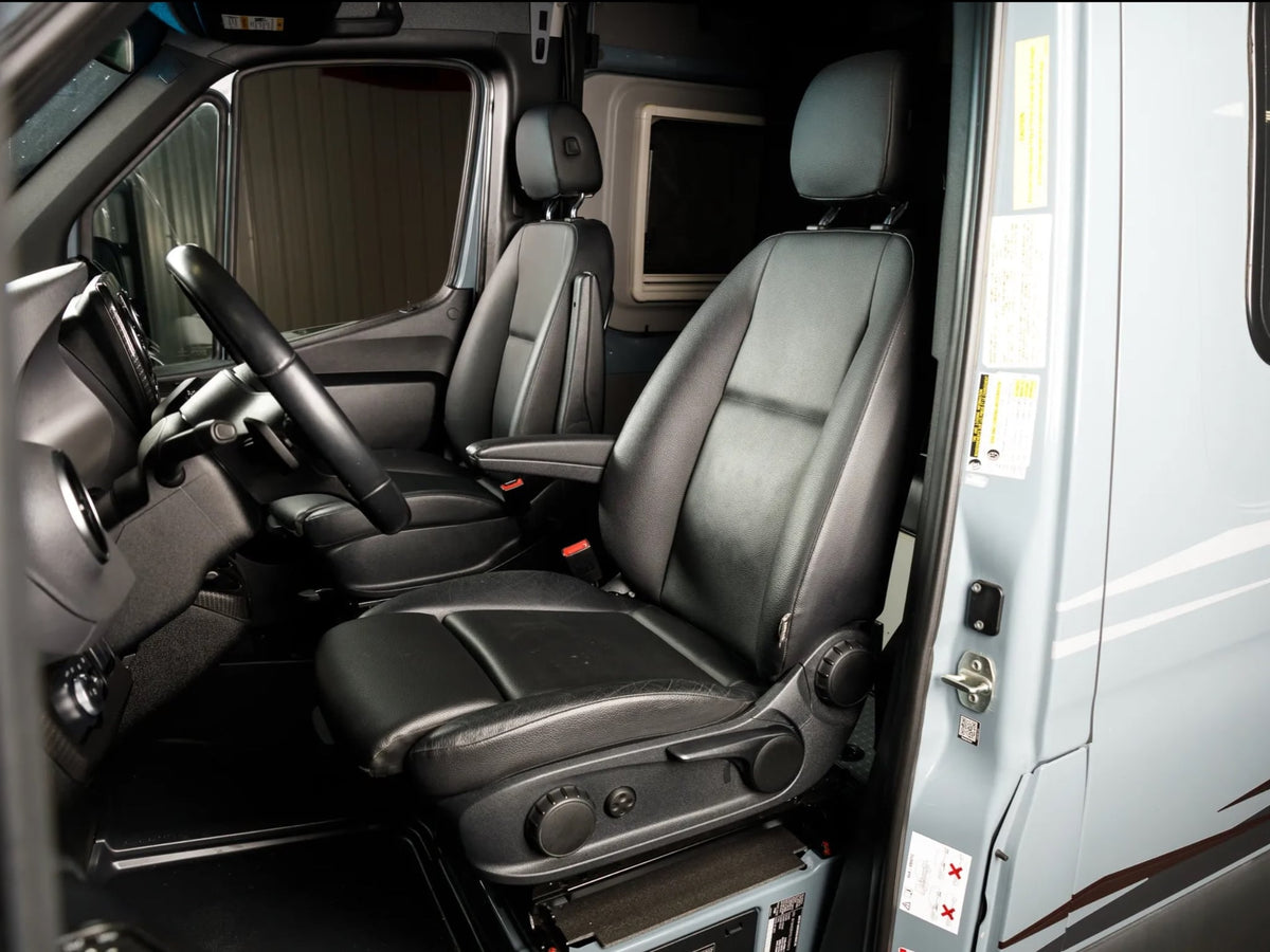  ready for adventure.|Light blue Winnebago Revel Sprinter 4x4 camper van with roof rack & ladder — photo 5