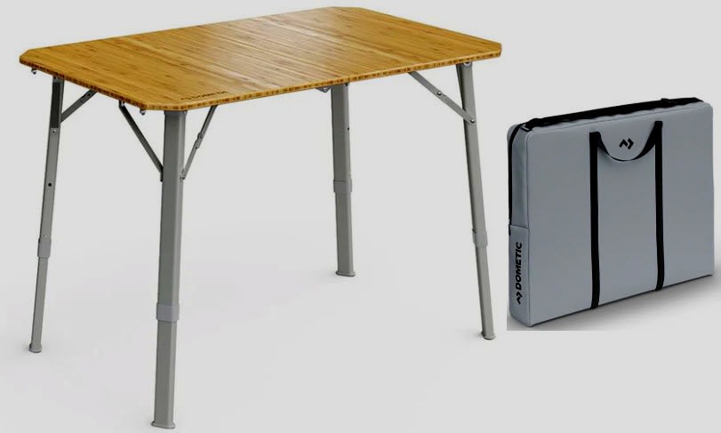 Collapsible Dometic table and carry case for RV rental trips. Adjustable, portable outdoor furniture for camping.