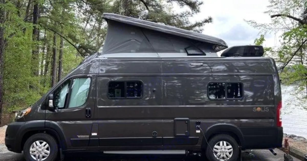  parked by a lake — photo 3