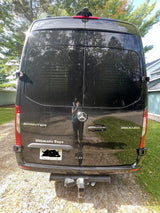 Black Mercedes-Benz Sprinter "Ultimate Toys" van. Explore with this RV rental!