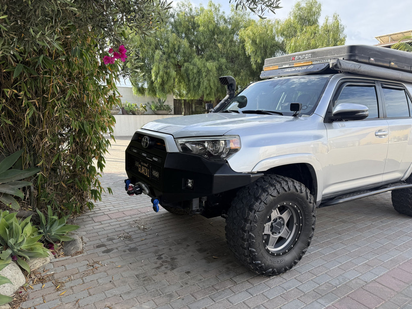 4Runner front three-quarter showing Pelfreybilt aluminum bumper and all-terrain tires — photo 2