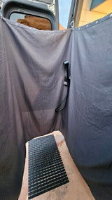 RV rental outdoor shower with privacy enclosure, mounted shower head, and floor mat for comfortable camping.
