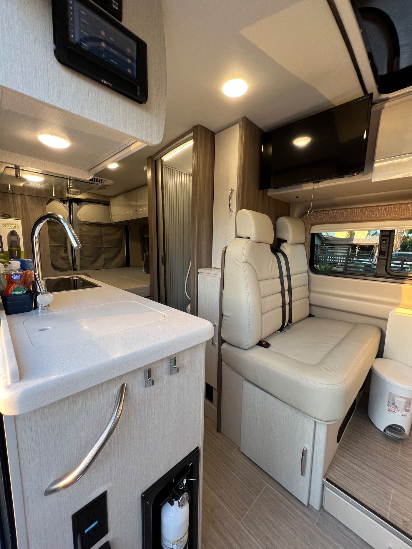  with a bike rack. Perfect rv rental for your travels!|Spacious RV rental interior with modern kitchen — photo 13